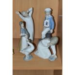 FIVE LLADRO FIGURES, comprising Boy with Yacht model no 4810, sculptor Salvador Furio, issued 1972-