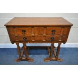 A REPRODUCTION OAK SIDE TABLE, in the Cotswold school style, with two short over a single long