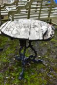A CAST ALUMINIUM GARDEN TABLE, diameter 70cm x height 71cm (condition:-wooden top distressed and