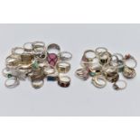 AN ASSORTMENT OF WHITE METAL RINGS, forty-three rings in total, of various designs, some with