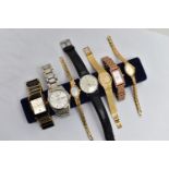 A SMALL BOX OF WATCHES, to include a yellow metal 'Rotary' ladys cocktail watch, two ladys 'Sekonda'