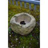 AN ANTIQUE STONE PLANTER, of a circular form, max diameter 50cm x height 27cm