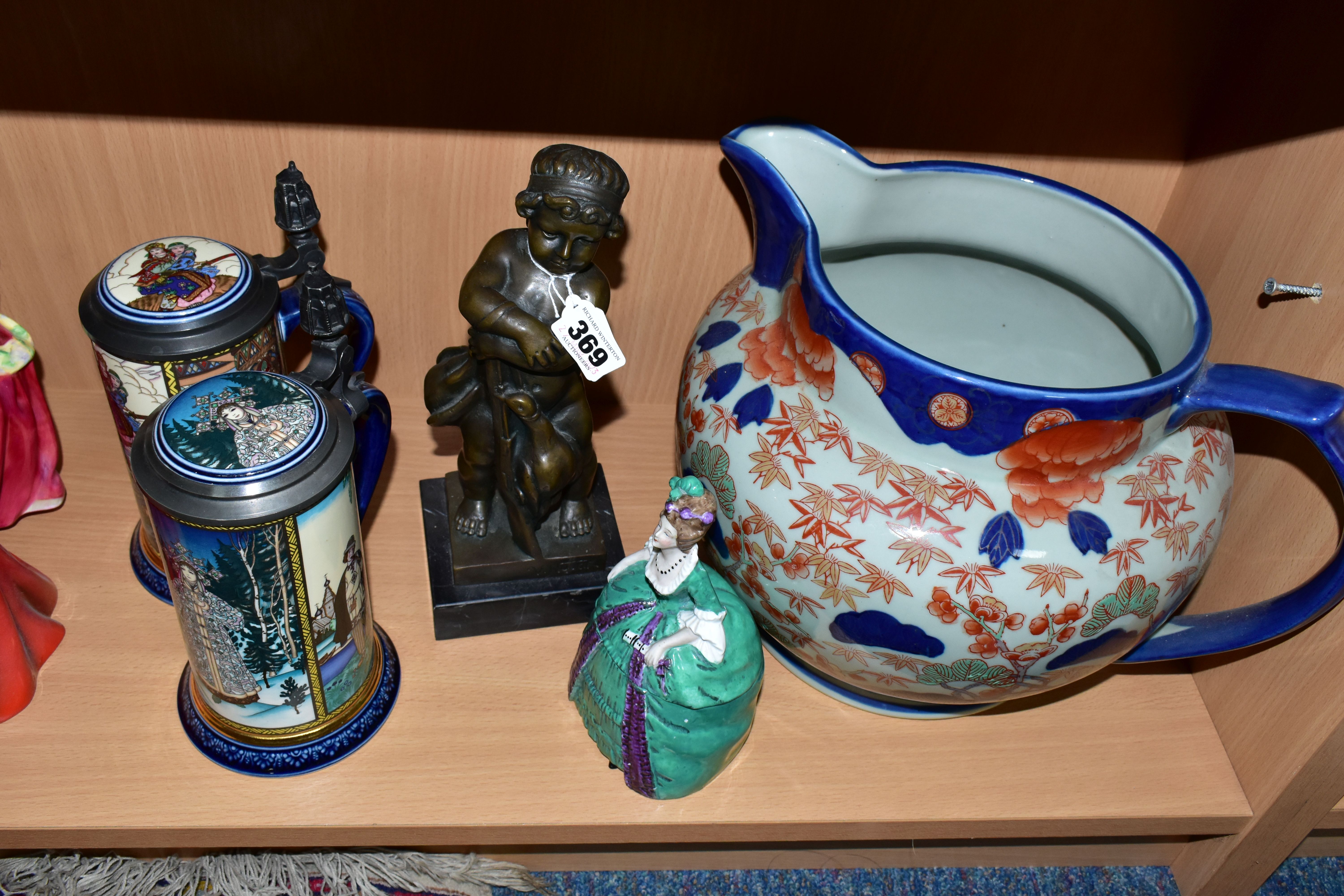 A BRONZE FIGURE AND A GROUP OF CERAMICS, comprising a bronze figure of a boy with a gun and two - Image 4 of 7