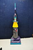 A DYSON DC07 ORIGIN UPRIGHT VACUUM CLEANER (Filter clip loose/broken) (PAT pass and working)
