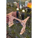 A PINK PAINTED WROUGHT IRON TABLE BASE, length 80cm x 43cm x height 71cm (condition:-distressed