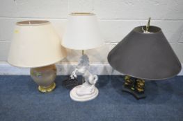A CHELSOM LIGHTING MODEL CN/7784/BA EBONISED AND GILT TABLE LAMP, with a black shade, along with a