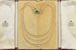 A CULTURED PEARL NECKLACE WITH EMERALD AND DIAMOND CLASP, designed as three graduating rows of