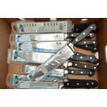 A BOX OF NEW AND PACKAGED KITCHEN KNIVES, twelve in total, to include three 8 chefs knives, three