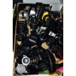 A BOX CONTAINING FILM CAMERAS AND LENSES including a Chinon CE4 SLR fitted with an Auto Chinon