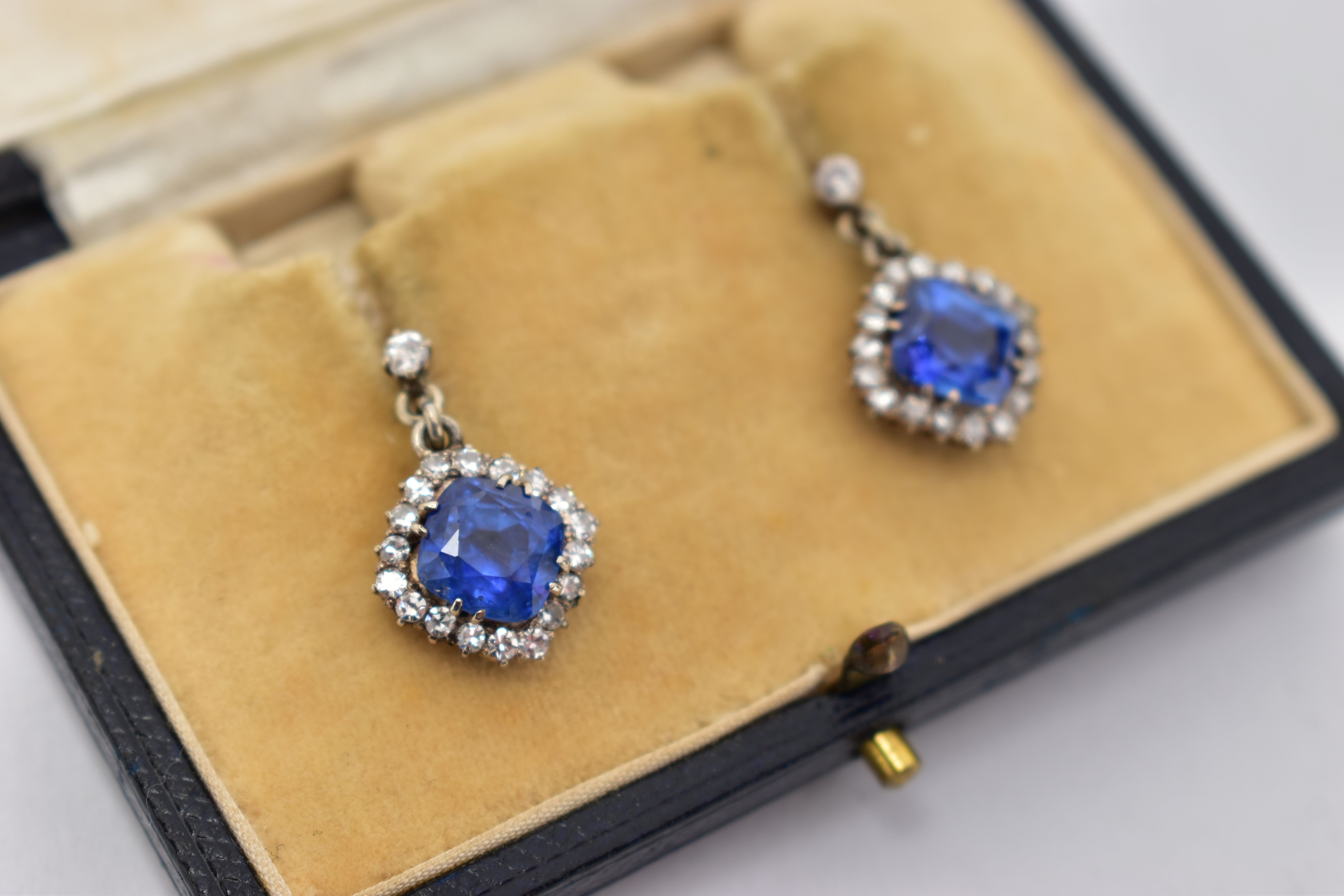 A PAIR OF EARLY 20TH CENTURY SAPPHIRE AND DIAMOND EARRINGS, each earring set with a cushion cut - Image 3 of 11