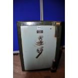 A STEPHEN COX AND SONS SAFE with key, measuring width 46cm x depth d5cm x height 62cm (VERY HEAVY)