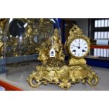 A GILT JAPY FRERES FIGURAL MANTEL CLOCK WITH DOME, the gilt scrolling base surmounted by a figure of