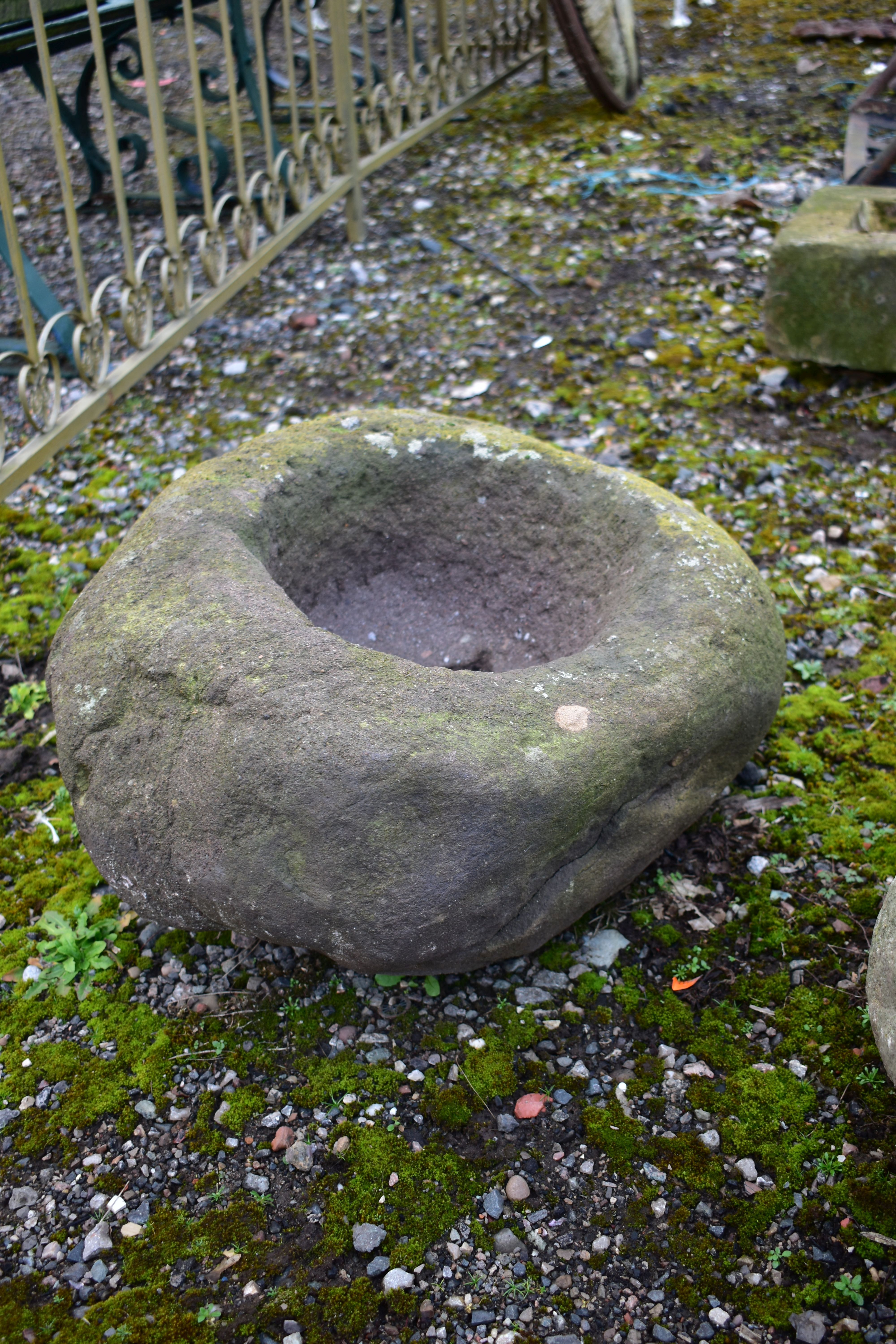 AN ANTIQUE STONE PLANTER, of a circular form, max diameter 53cm x height 27cm