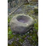 AN ANTIQUE STONE PLANTER, of a circular form, max diameter 53cm x height 27cm