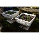 A PAIR OF PAINTED COMPOSITE SQUARE TAPERED PLANTERS, on a square stepped base, 49cm squared x