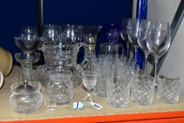 A GROUP OF CUT CRYSTAL AND OTHER GLASSWARES, over thirty pieces to include a set of four Waterford