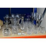 A GROUP OF CUT CRYSTAL AND OTHER GLASSWARES, over thirty pieces to include a set of four Waterford