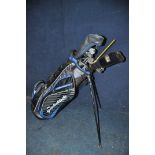 GOLFING EQUIPMENT to include a TaylorMade golf bag containing some TaylorMade clubs, Callaway club