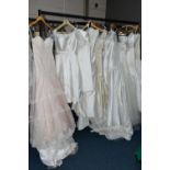A GROUP OF TEN WEDDING DRESSES, end of season stock clearance, some dresses may have marks or