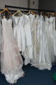 A GROUP OF TEN WEDDING DRESSES, end of season stock clearance, some dresses may have marks or