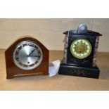TWO MANTEL CLOCKS, comprising a black slate mantel clock with red marble inserts, engraved foliate