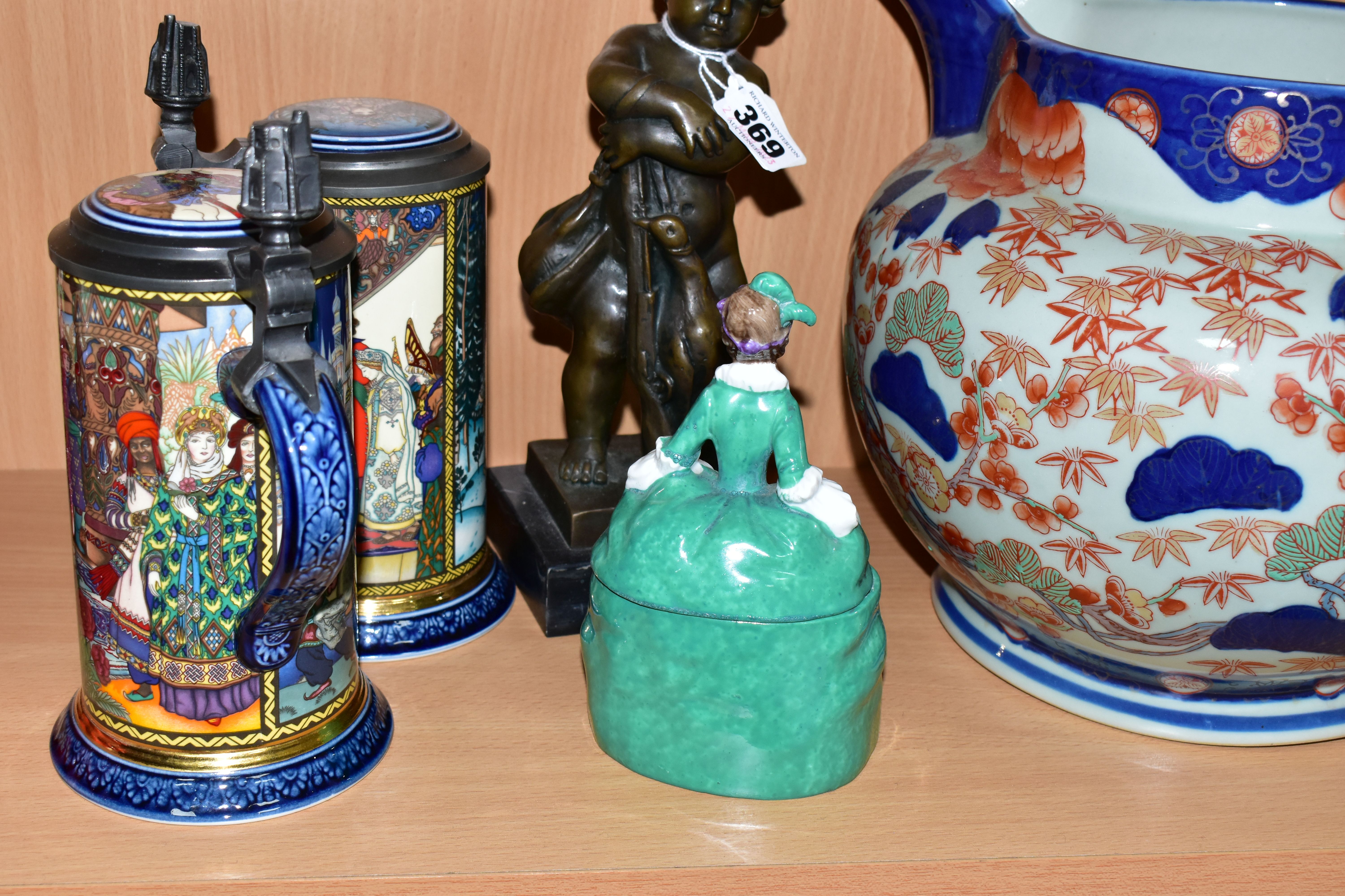 A BRONZE FIGURE AND A GROUP OF CERAMICS, comprising a bronze figure of a boy with a gun and two - Image 3 of 7