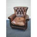 A BROWN LEATHER BUTTONED ARMCHAIR, on square legs and casters, width 82cm x depth 85cm x height 90cm