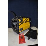 A WOLF MIG140X MIG WELDER, combination gas and no gas welding with welding mask and a pair of