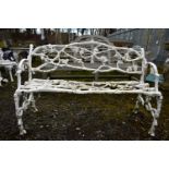 A 19TH COALBROOKDALE STYLE CAST IRON GARDEN BENCH, serpent and twig design with intertwined fruiting