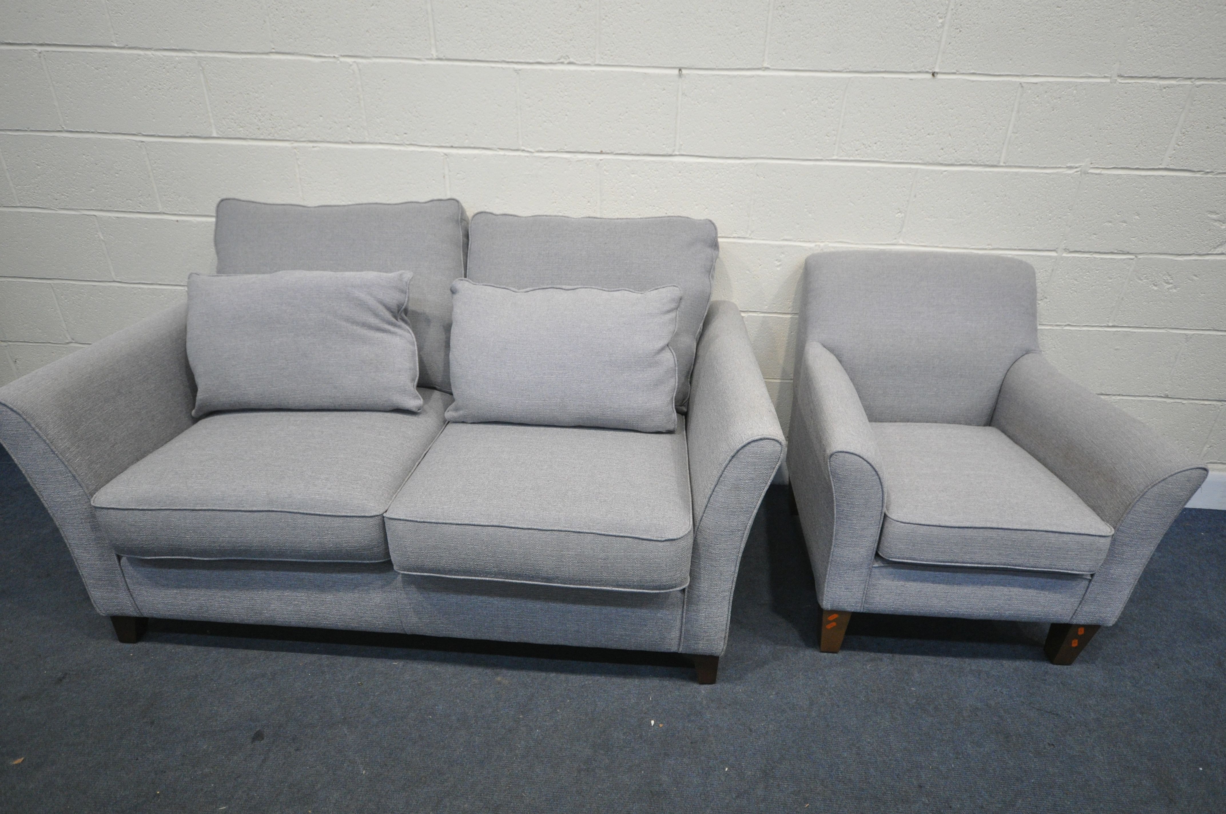 A TWO PIECE GREY UPHOSTERED LOUNGE SUITE, comprising a sofa and armchair (condition:-good