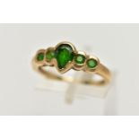 A 9CT GOLD CHROME DIOPSIDE RING, designed with a central pear cut stone flanked with four smaller