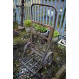 A VINTAGE WROUGHT IRON SACK TRUCK, with spindle cart wheels