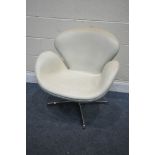 IN THE MANNER OF ARNE JACOBSEN FOR FRITZ HANSEN, A MID-CENTURY CREAM LEATHER SWAN CHAIR, width
