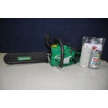 A GARDENLINE CSP41 49cc PETROL CHAINSAW along with a bottle of two stroke oil and a mixing bottle (