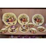 FOURTEEN PIECES OF AYNSLEY ORCHARD GOLD TEA AND GIFT WARES, comprising a cake plate, two wavy rimmed