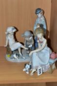 A GROUP OF LLADRO FIGURES, comprising 'Try This One' 5361 - Regino Torrijos 1986-1998, 'Chit Chat'