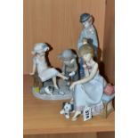 A GROUP OF LLADRO FIGURES, comprising 'Try This One' 5361 - Regino Torrijos 1986-1998, 'Chit Chat'