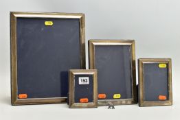 A SET OF FOUR ELIZABETH II SILVER MOUNTED EASEL BACK PHOTOGRAPH FRAMES OF RECTANGULAR FORM, with a