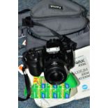 A MINOLTA DYNAX 300Si FILM SLR CAMERA fitted with an AF Zoom 35-70mm f3.5 lens, Hama soft case and