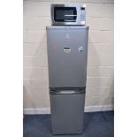 A INDESIT CM02 FRIDGE FREEZER measuring width 54cm x depth 58cm x height 174cm, along with a