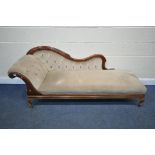 AN EDWARDIAN CHAISE LOUNGE, with mahogany frame, buttoned beige upholstery, on cabriole legs, and