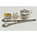 FOUR SMALL PIECES OF SILVER, comprising a late Victorian mustard with floral repoussé decoration and