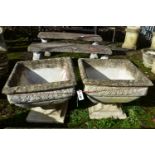 A PAIR OF WEATHERED COMPOSITE SQUARE PLANTERS, on a separate base, 52cm x height 43cm (condition:-no