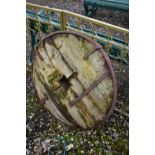 A HISTORIC CAST IRON AND TIMBER OX CART WHEEL, diameter 86cm