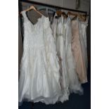 A GROUP OF ELEVEN WEDDING DRESSES, end of season clearance, some dresses may have marks or minor