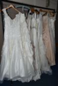 A GROUP OF ELEVEN WEDDING DRESSES, end of season clearance, some dresses may have marks or minor