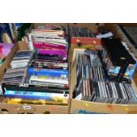 FOUR BOXES OF MUSIC to include over 240 CD's, twenty+ VHS video cassettes, twenty+ books and forty-