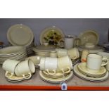 A POOLE POTTERY BROADSTONE COMPACT SHAPE DINNER SET, comprising one sugar bowl, two egg cups, salt