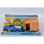 A BOXED BRITAINS LAND ROVER, HORSE BOX AND HUNTER HORSE, No.9575, playworn condition with some paint