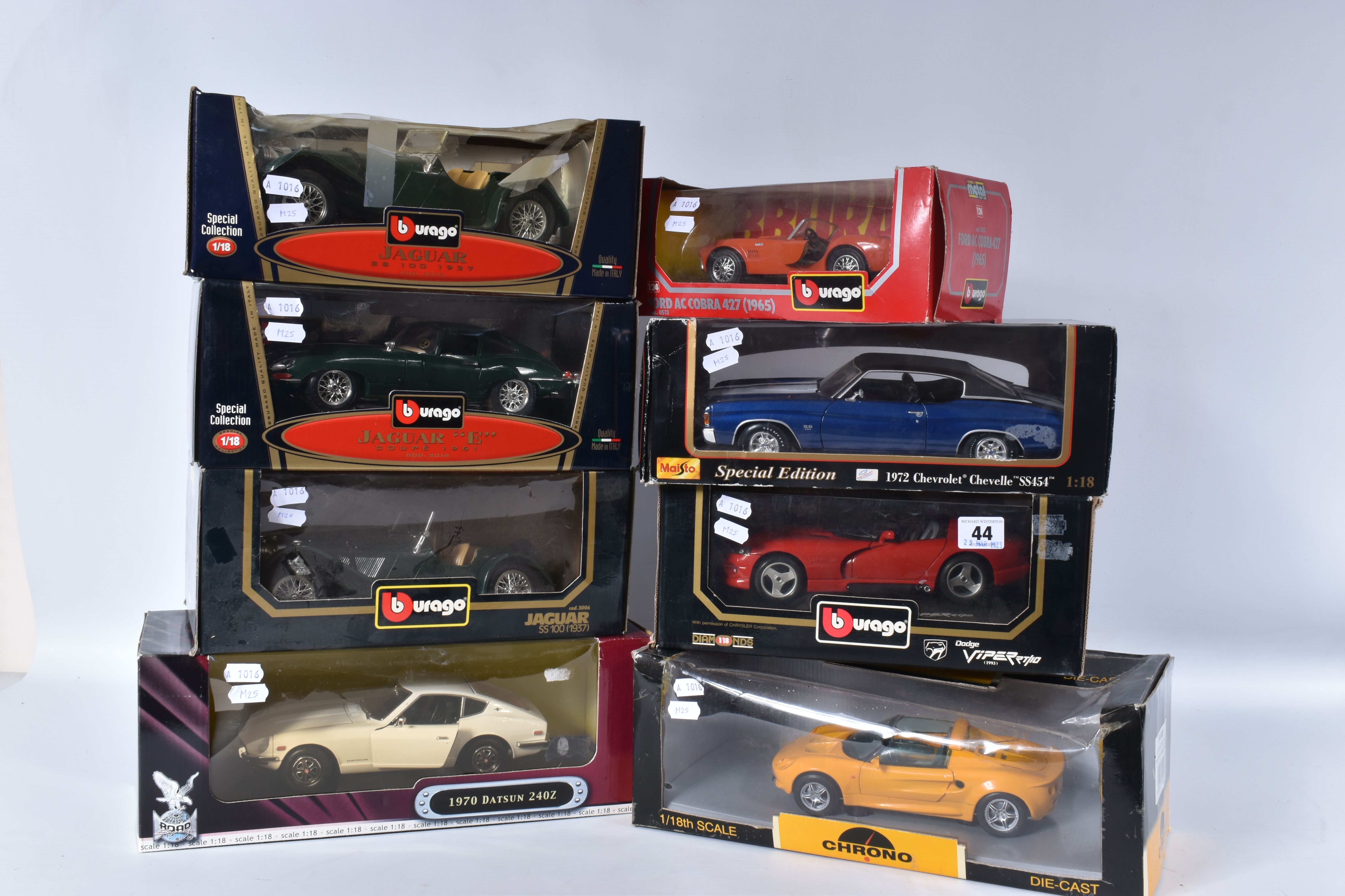 A COLLECTION OF ASSORTED BOXED 1:18 SCALE DIECAST SPORTS CAR MODELS, assorted models of British,